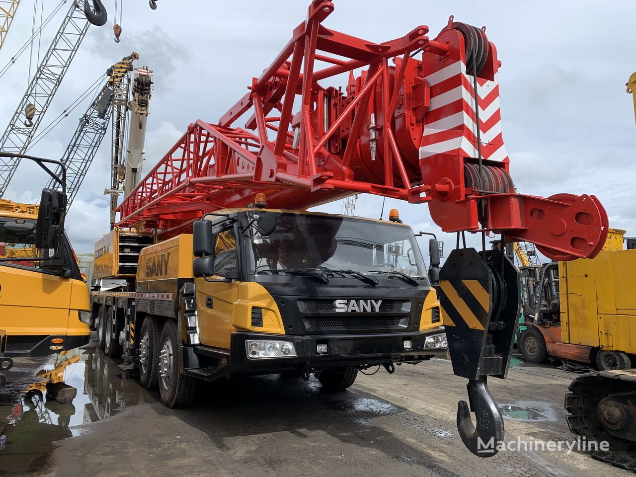 żuraw samojezdny Sany Sany STC1000 used 100 ton hydraulic mounted mobile truck crane